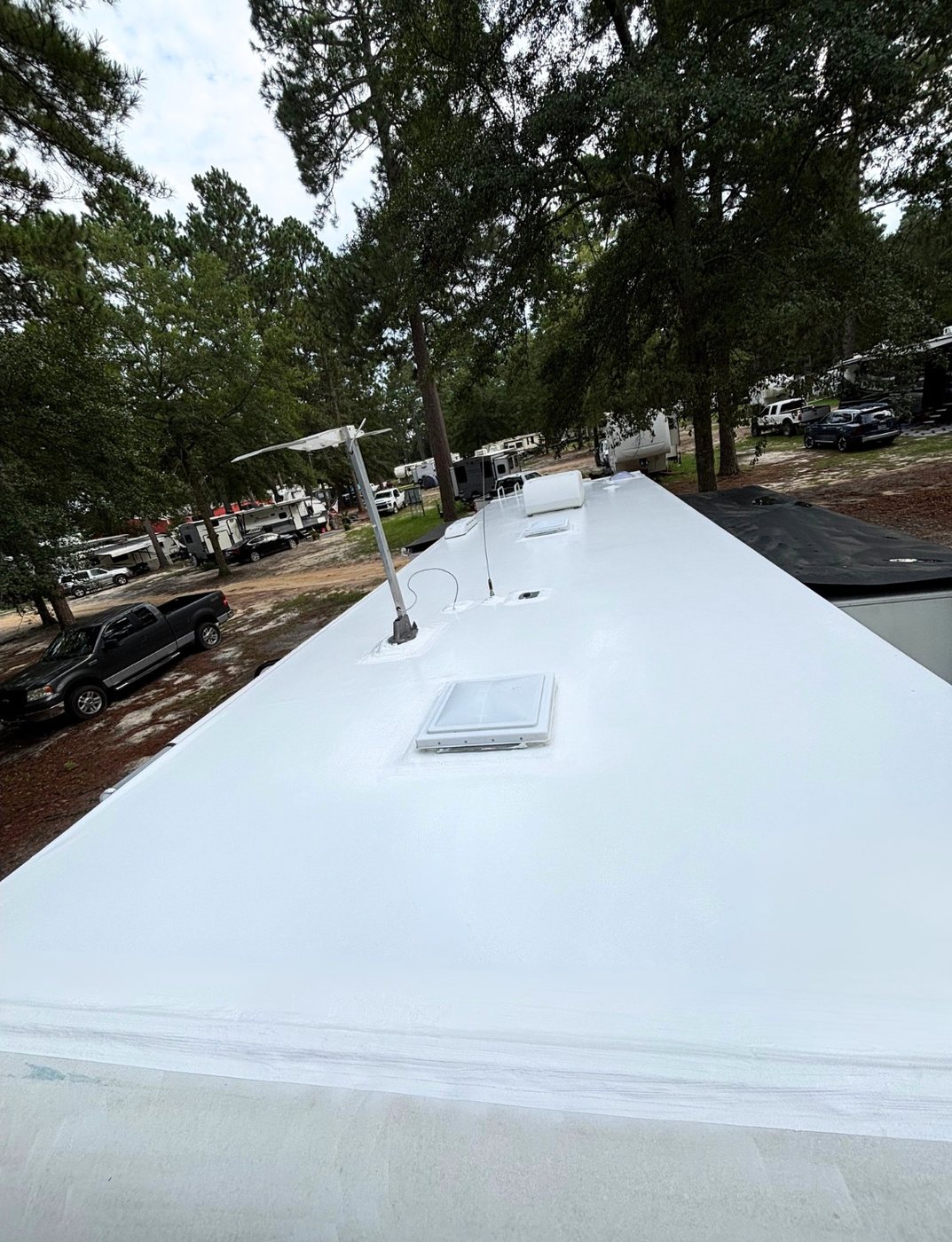 Coated RV roof at a campground